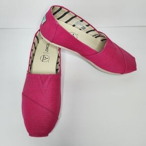 TOMS alpargata slip-on. Size 8.5 women's. Raspberry pink color. Worn once.